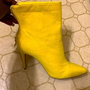 Bright yellow pointed suede bootie heels. Size 8.5